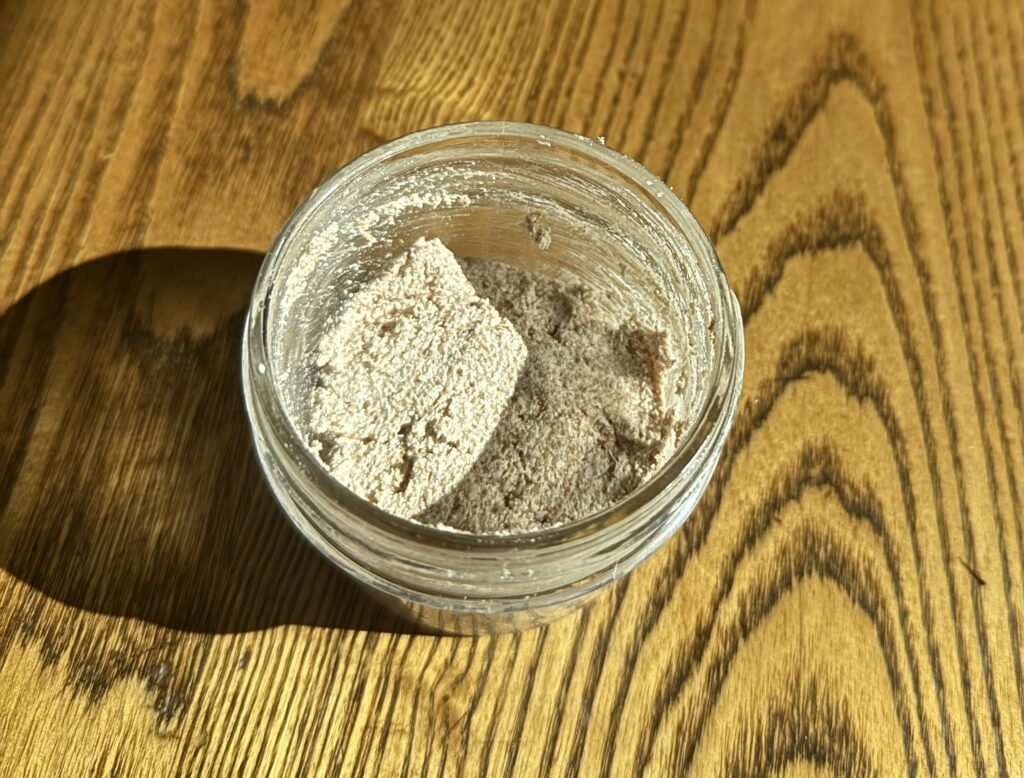 Homemade eggshell toothpaste in glass jar